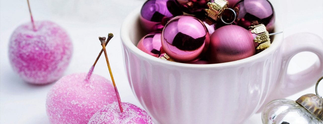 Purple baubles in a cup