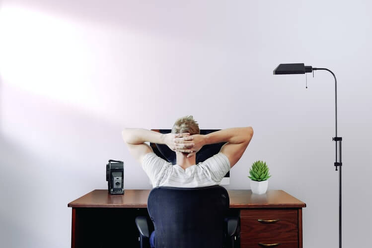 Man sitting in front of a computer