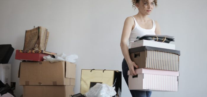 girl is decluttering a home