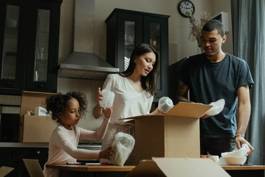 A family preparing for long-distance movers