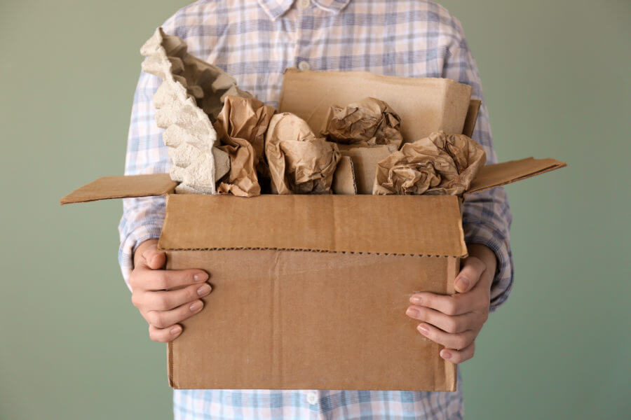 A man holding boxes