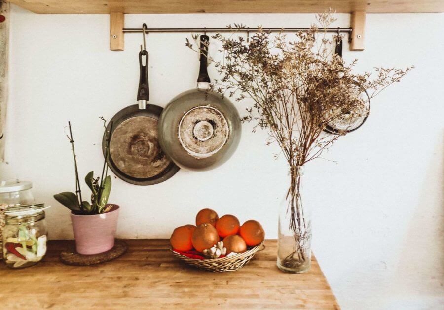 pots and pans on a kitchen wall ready for long-distance moving