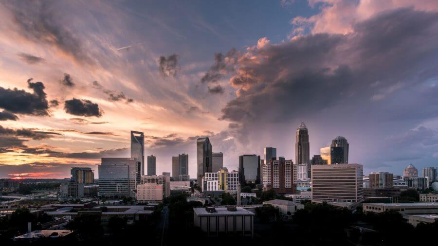 A view of the sunset over buildings in Charlotte, North Carolina