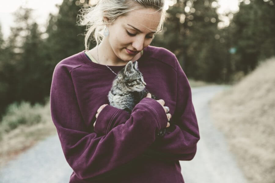 A girl with a kitten