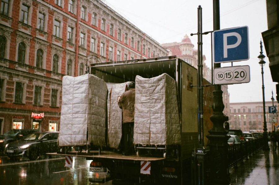 A truck in the street during rain