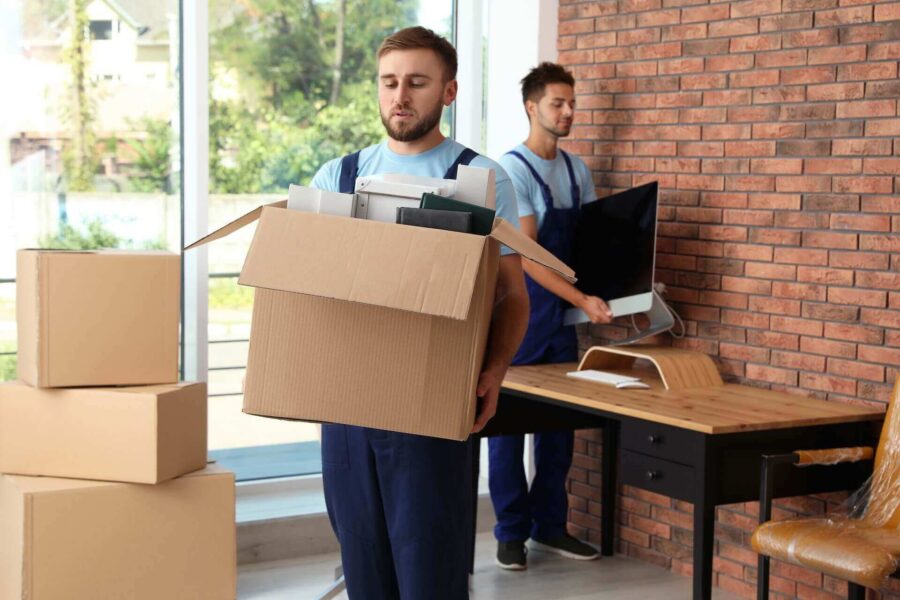 Long-distance mover packing an office