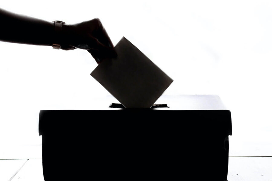 Person voting after moving cross-country