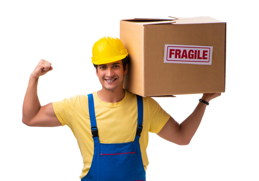 Professional mover holding a fragile box
