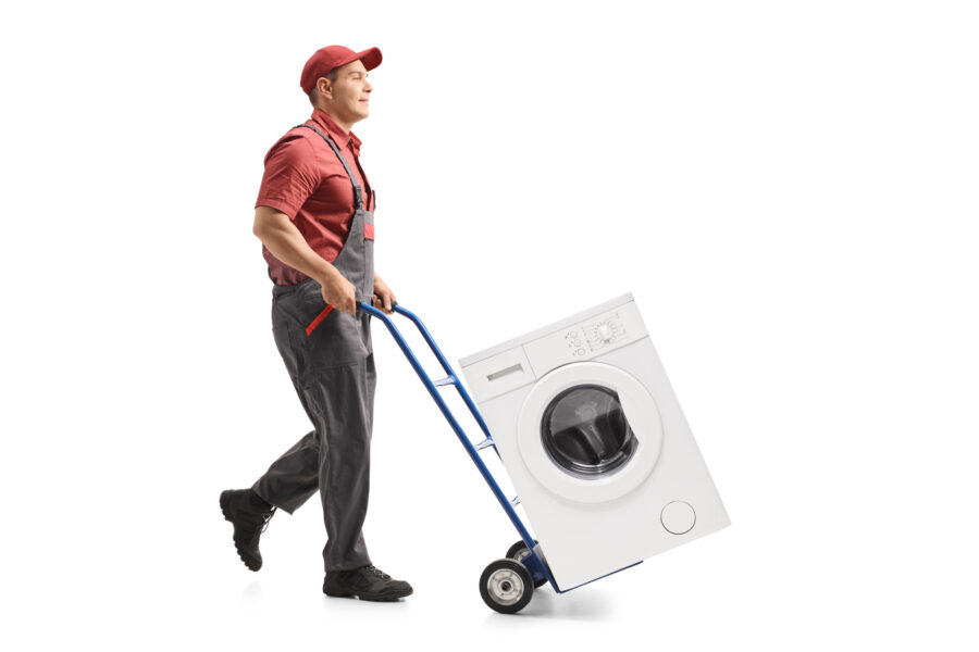 A long-distance mover moving a washing machine