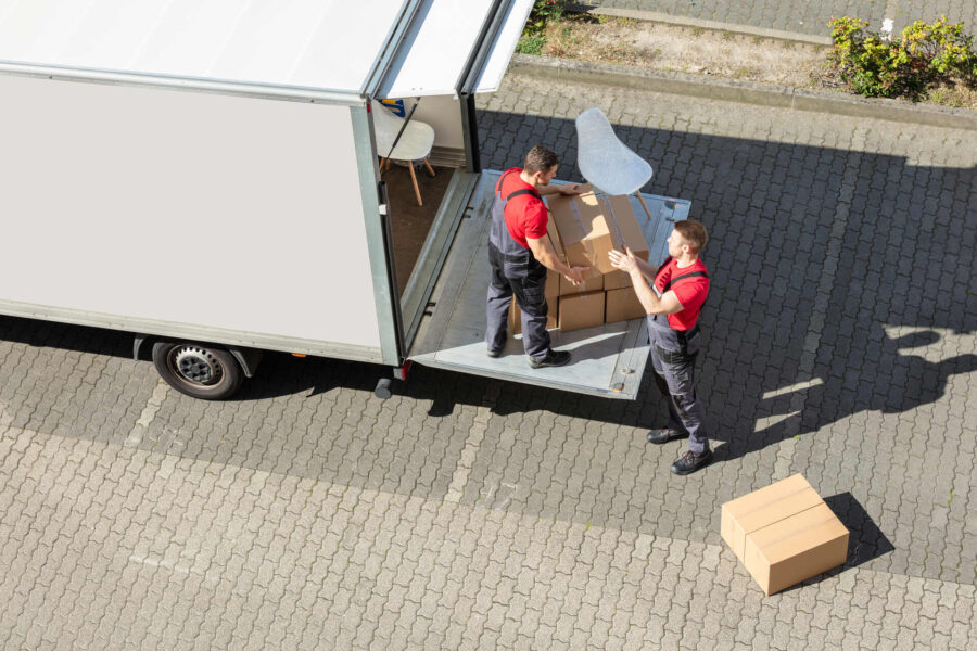 Long-distance movers loading the moving truck 