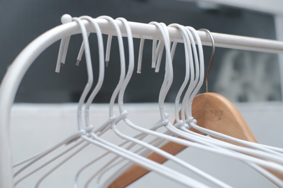 Thin metal hangers on a rack 