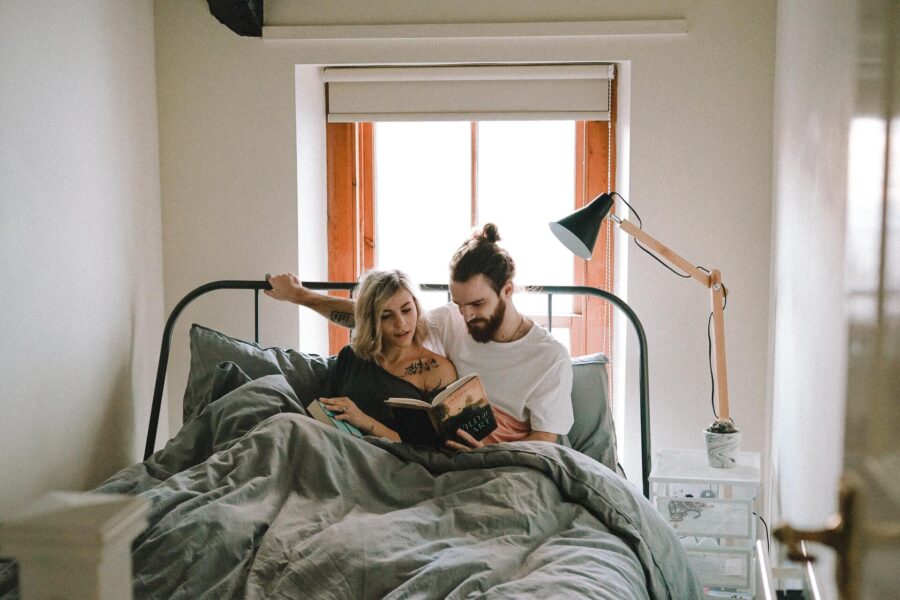 A couple reading in bed