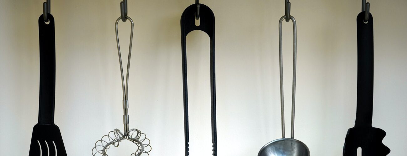Kitchen utensils hanging on the wall