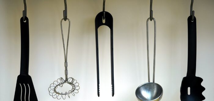 Kitchen utensils hanging on the wall