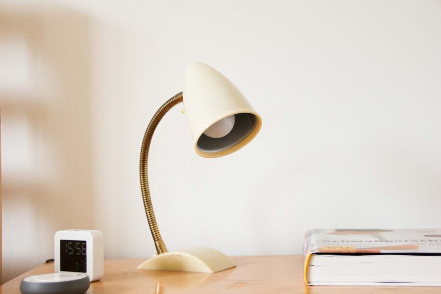 A lamp on a nightstand