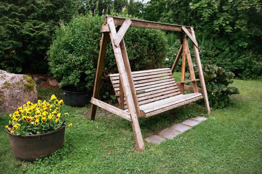 Garden swing with a wooden frame