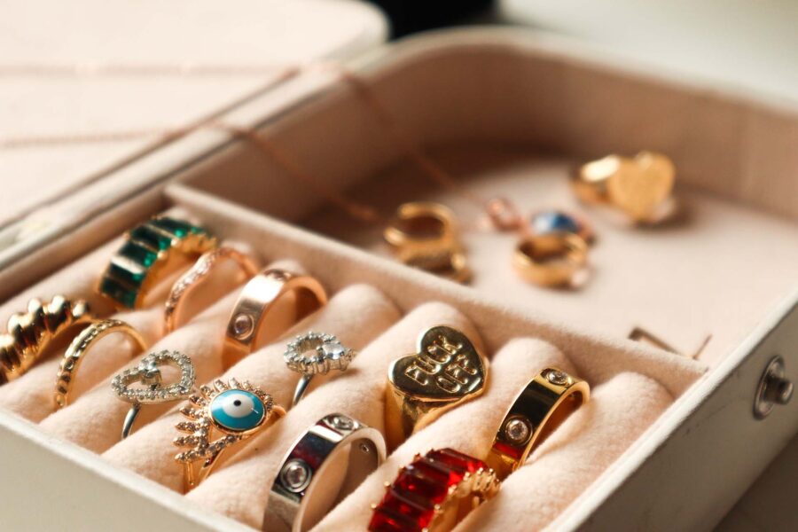 A jewelry box with lots of different rings