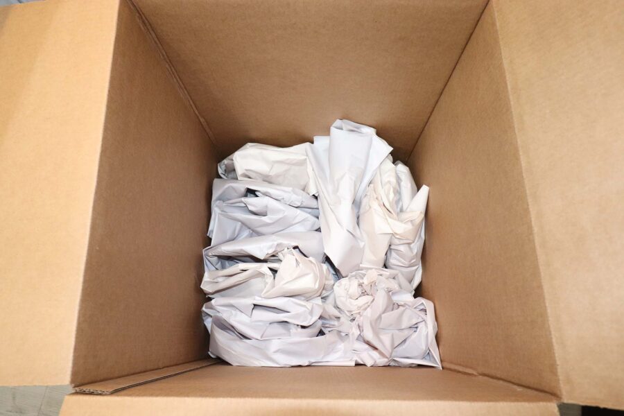A box stacked with packing materials ready for long-distance moving