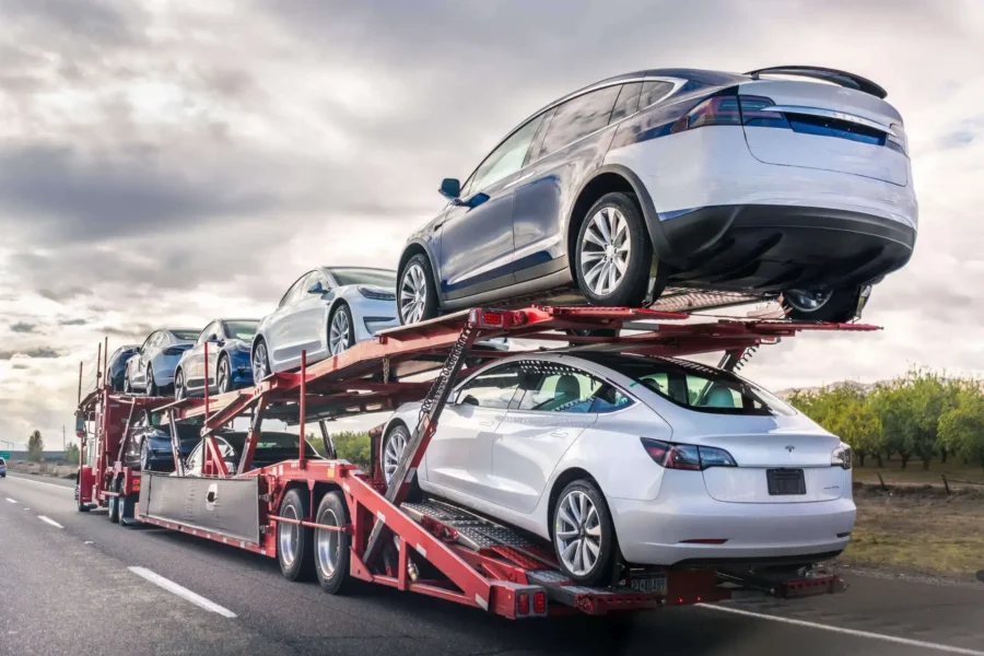 An open car carrier on the road